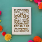 A cream and gold leaf laser cut Christmas card for babies. 