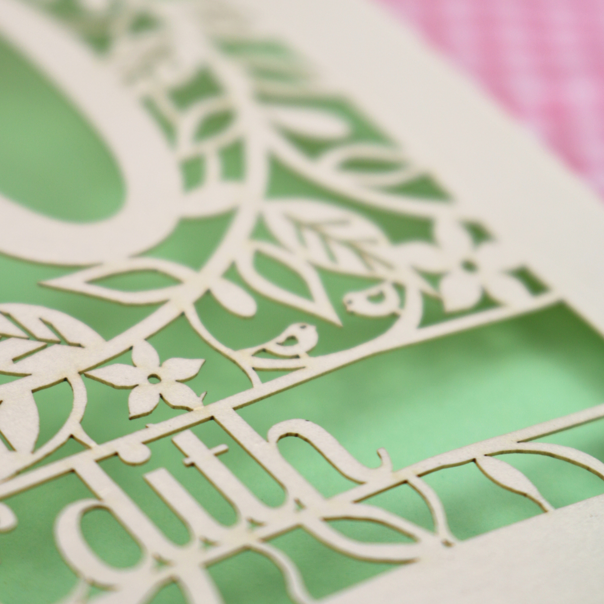 A personalized laser-cut birthday card close up with cut away details 