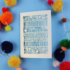 Personalised engagement Card with 'Congratulations on your engagement' text on a blue background with colourful pom-poms.