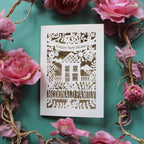 A unusual new home card, made in the UK. Card says "Happy new home" and is personalised with the recipient/s' name in a line of text