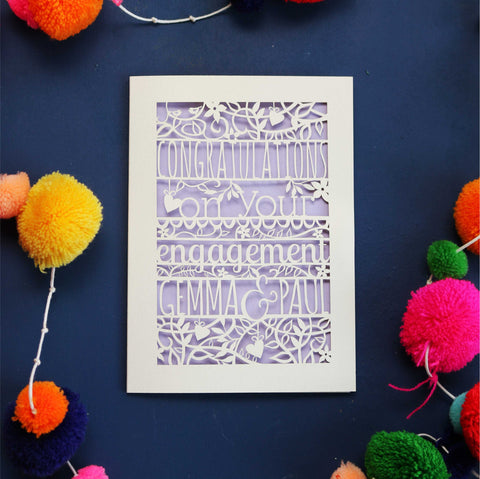 Cream and lilac laser cut cards UK. This is an image of a greeting card that says "Congratulations on your engagement, Gemma & Paul."  - A5 / Cream / Lilac