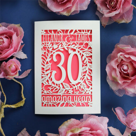 A cream and coral anniversary card. Card is laser cut and features floral details and text. - A5 / Coral