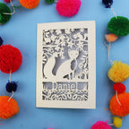 Decorative fox birthday card with fox design and colourful pom-poms on a blue background