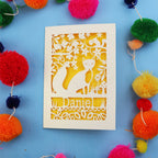 Decorative fox birthday card with fox design and colourful pom-poms on a blue background