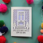 A cut out home card with front door and text