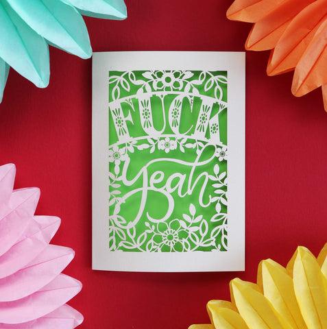 Laser cut congratulations card that says "Fuck Yeah"