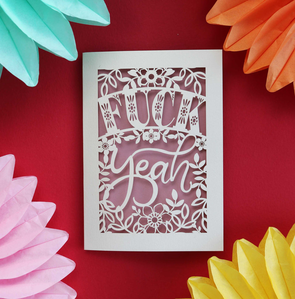 Laser cut congratulations card that says "Fuck Yeah"