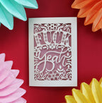 Laser cut congratulations card that says "Fuck Yeah"