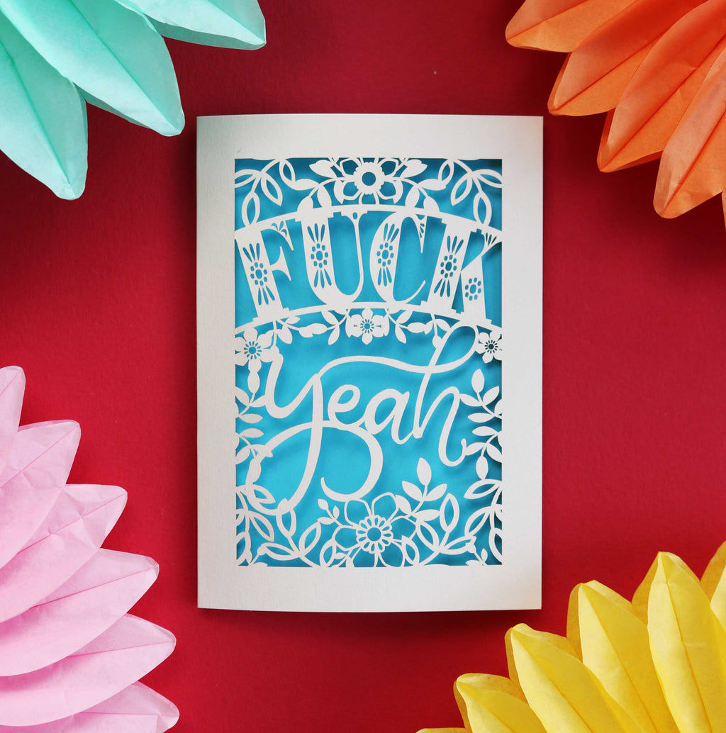 Laser cut congratulations card that says "Fuck Yeah"