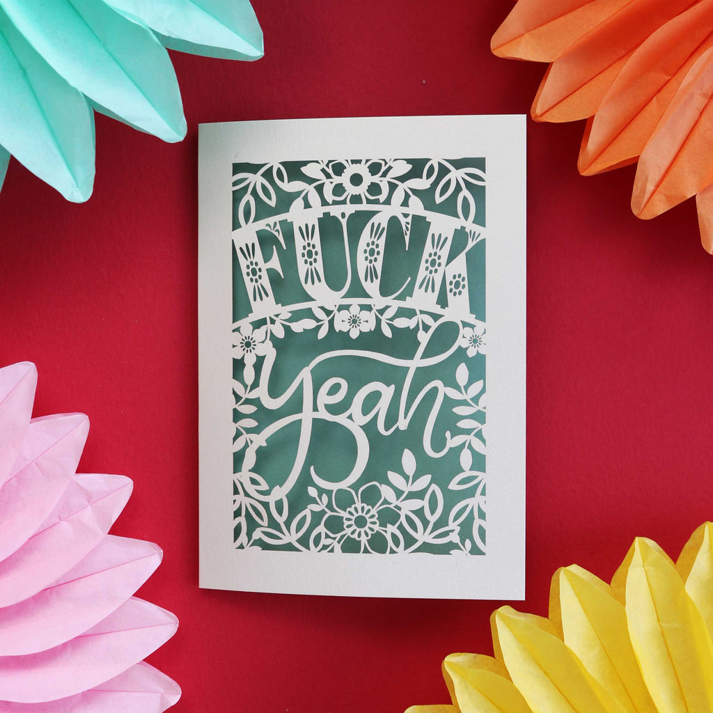 Laser cut congratulations card that says "Fuck Yeah"