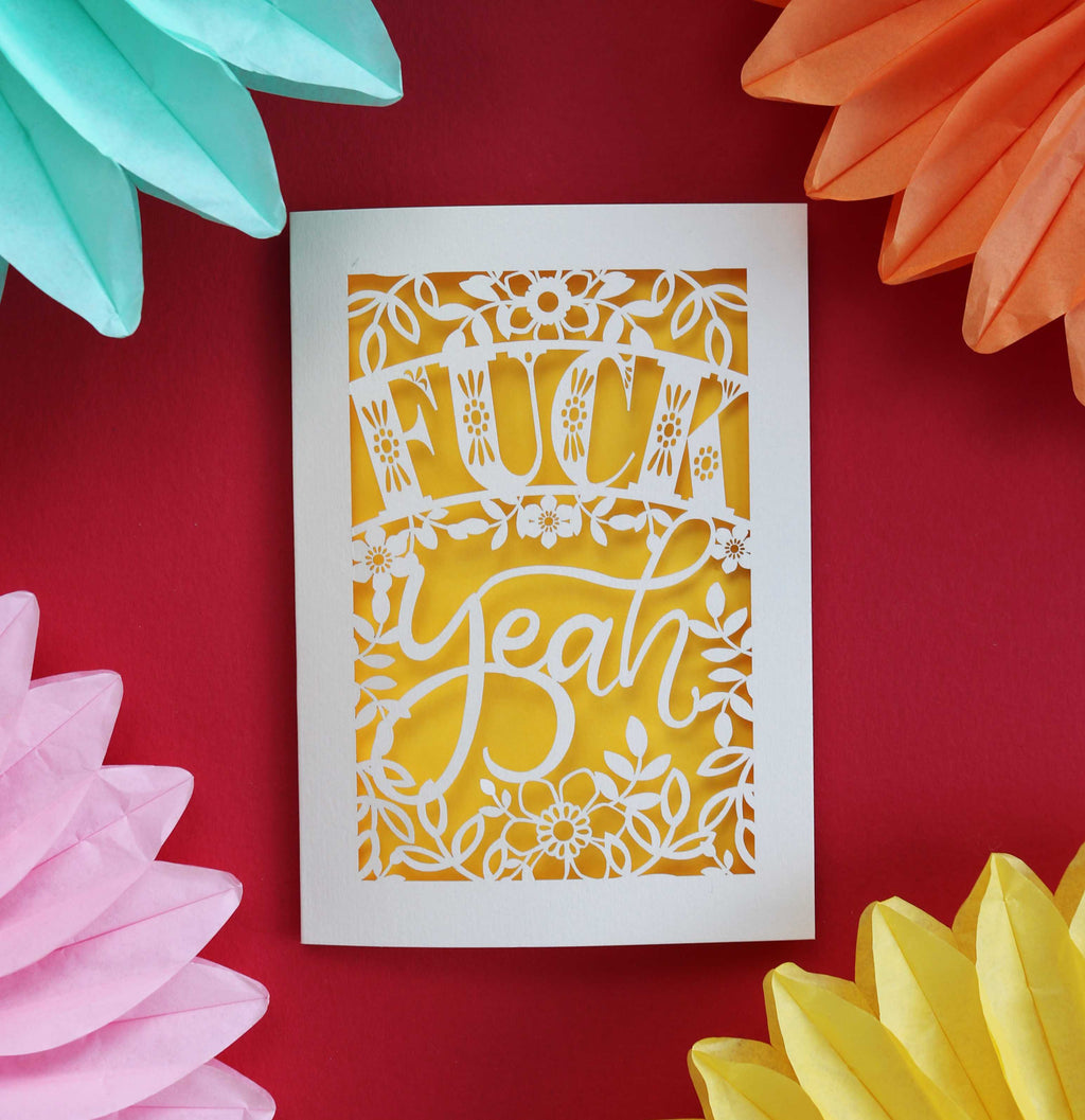 Laser cut congrats card that says "Fuck Yeah"