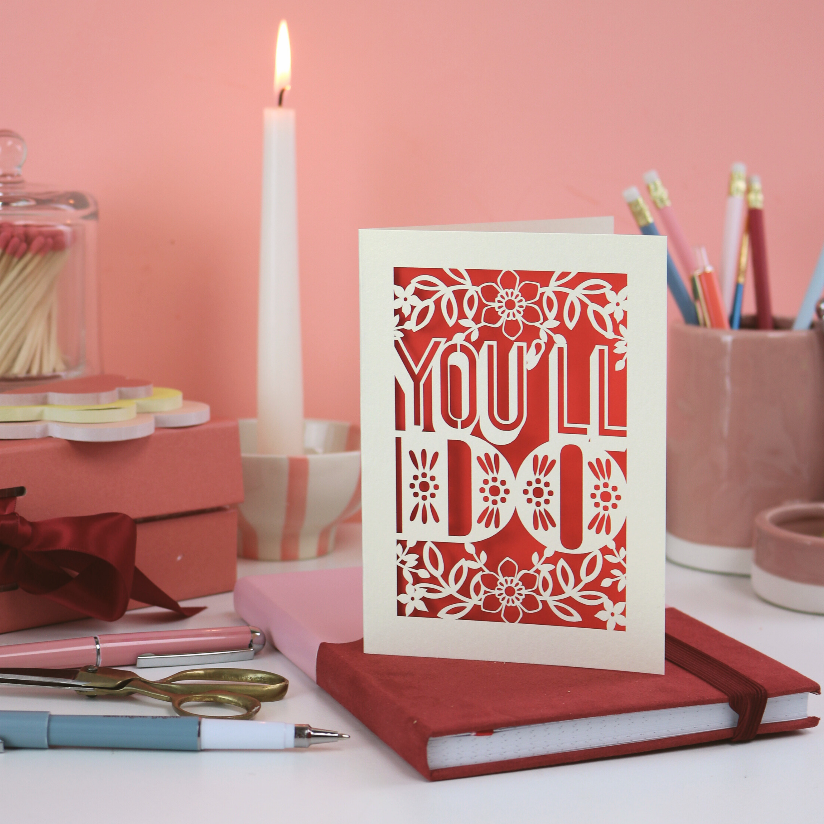 Funny laser cut Valentine's Card with 'You'll Do' design on a desk with stationery items