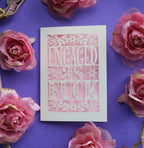 A funny engagement card for friends. Engaged as Fuck is cut out of a cream card with a candy pink background