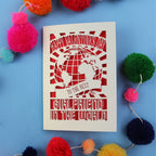 A unique girlfriend Valentine's card that features a paper cut out World design and the words "Happy Valentine's Day to the Best Girlfriend in the World"