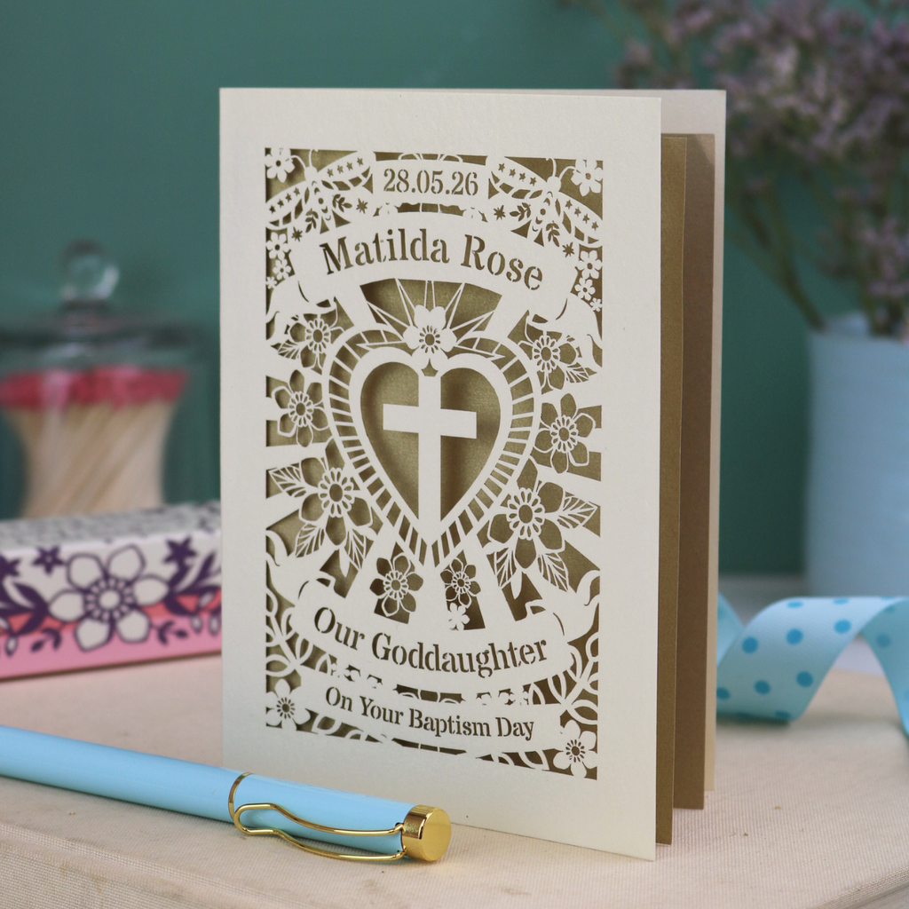 Personalised laser cut Godchild Christening or Baptism day card with decorative design and text on a wooden surface.