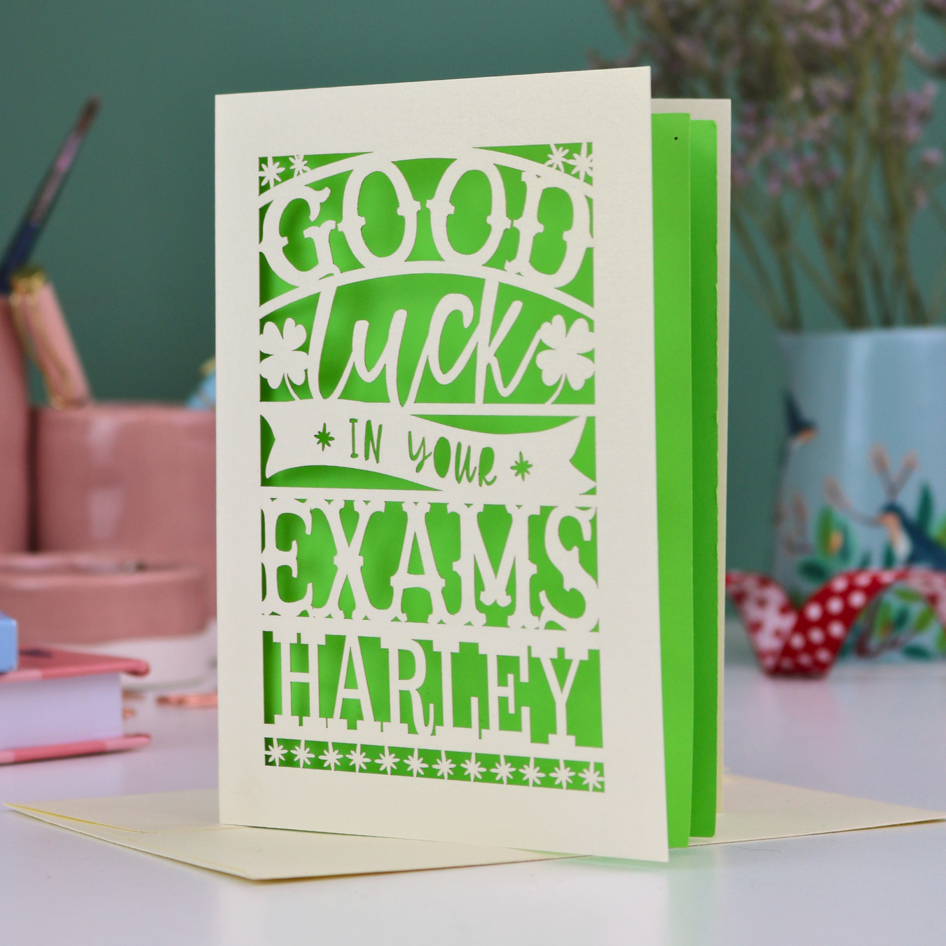 Good luck card for exams with personalized name on a desk