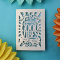 A laser cut get well soon card