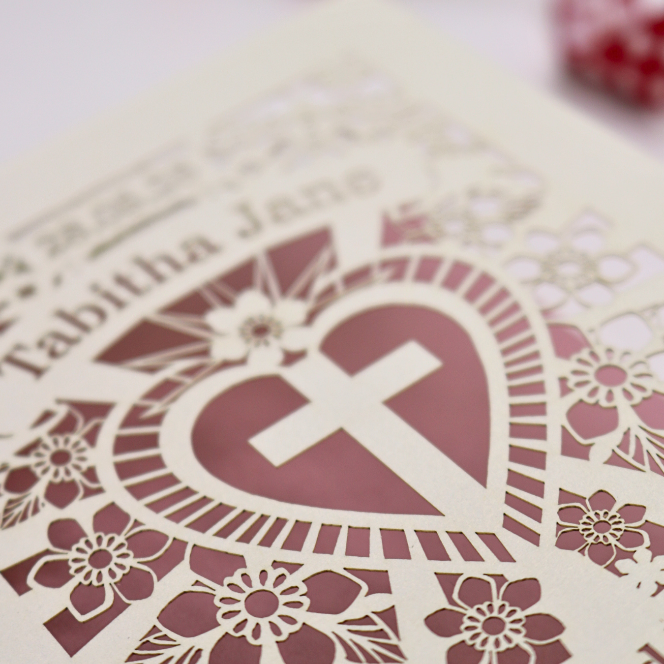 A close up detail image showing the laser cut 1st Holy Communion card