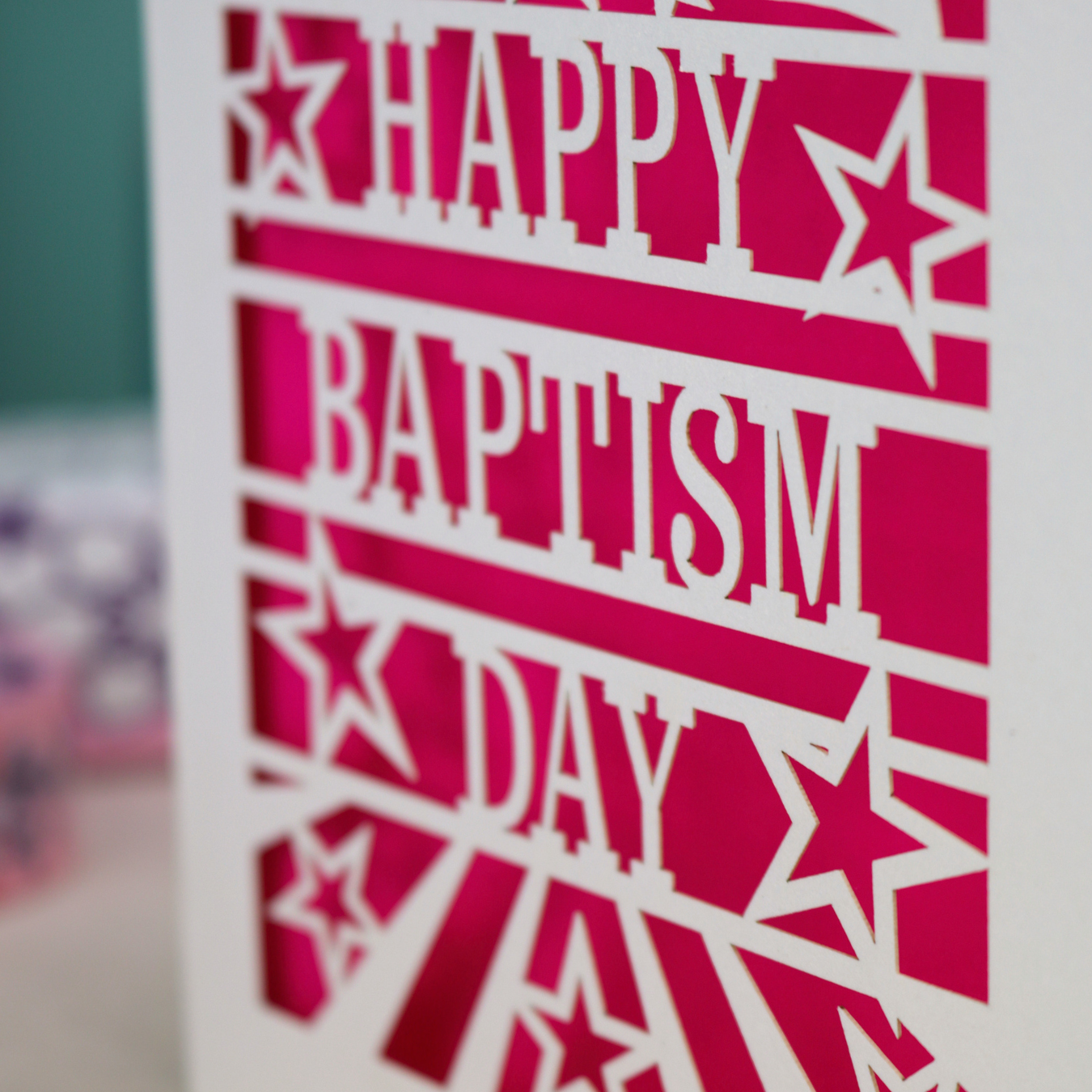 Baptism Card with 'Happy Baptism Day' text and star designs on a cream background