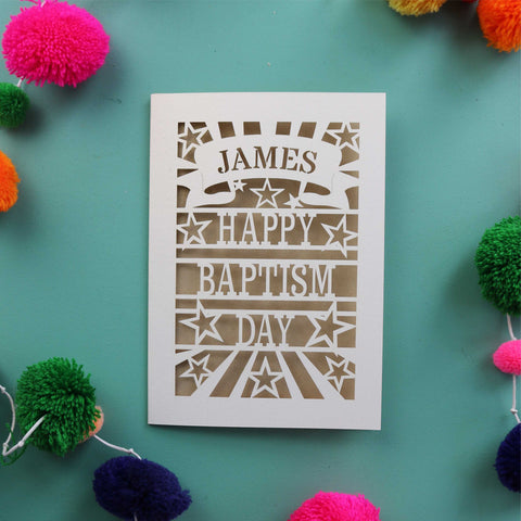 A fun Baptism card that is personalised with a first name in a banner and reads "Happy Baptism Day" - A5 / Gold Leaf