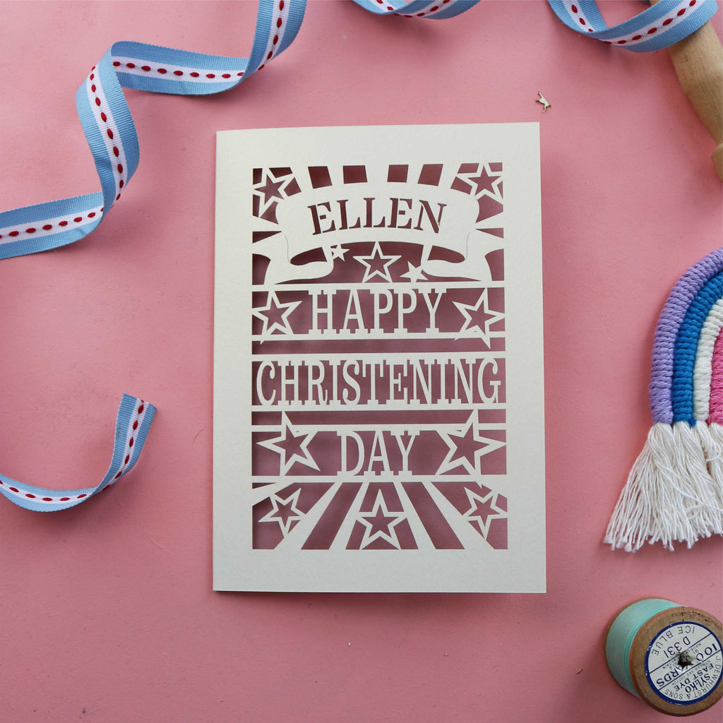 A papercut Christening card, personalised with a name
