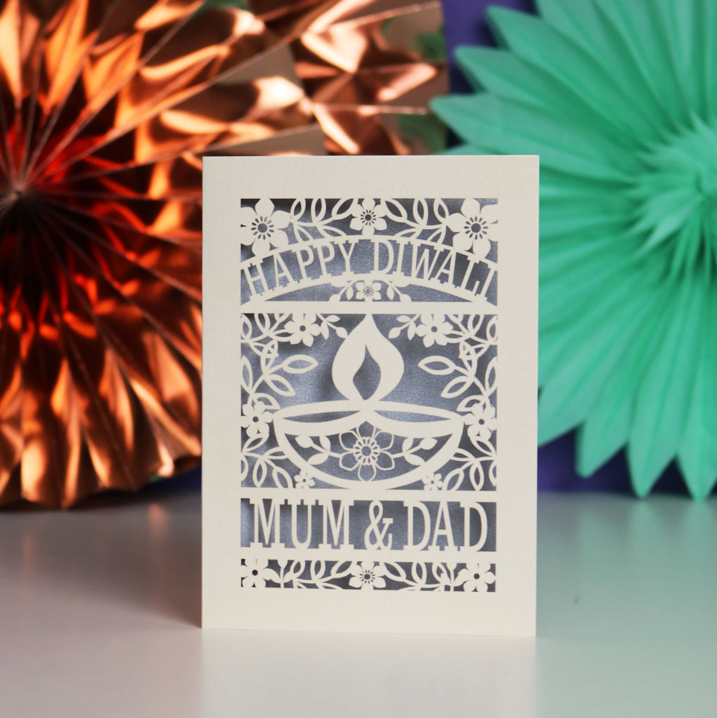 Decorative Diwali card with 'Happy Diwali' and 'Mum & Dad' text 