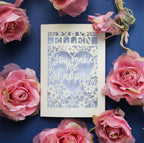 A personalised laser cut Valentines Day Card that says "Name, You make me happy."