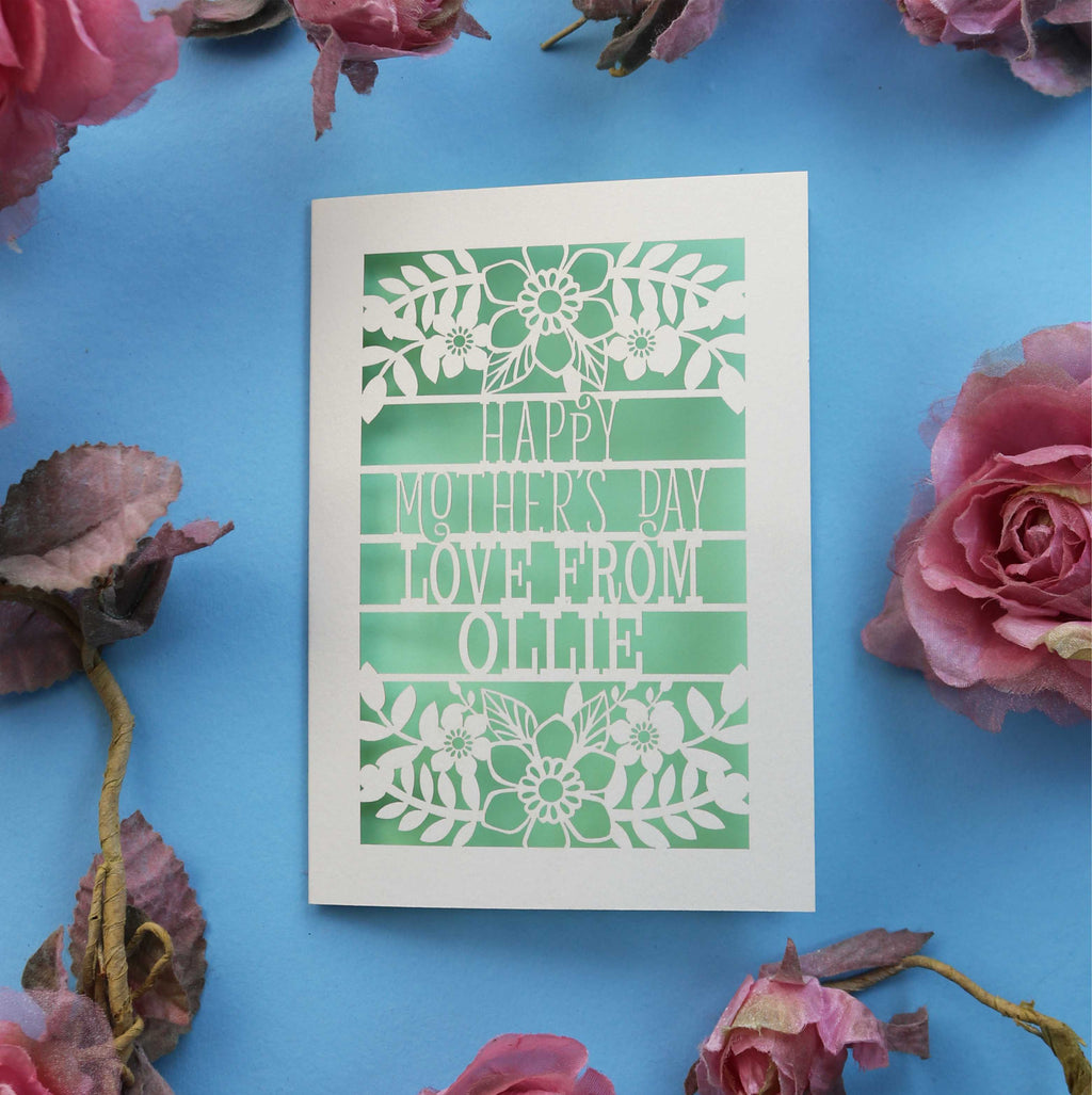 A papercut Mother's day card that says "Happy Mother's Day, Love from NAME"
