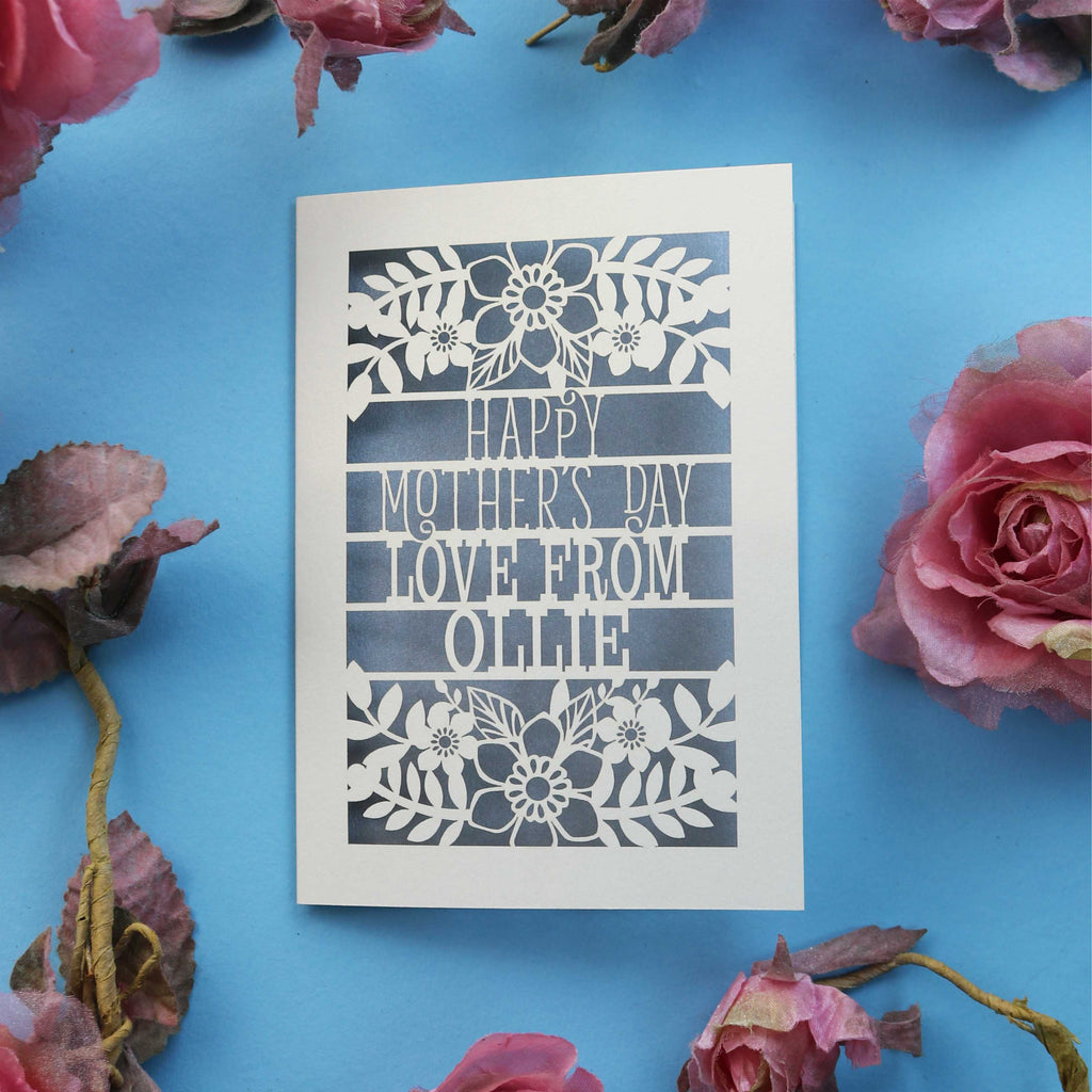 A personalised cut out Mother's day card that says "Happy Mother's Day, Love from NAME"