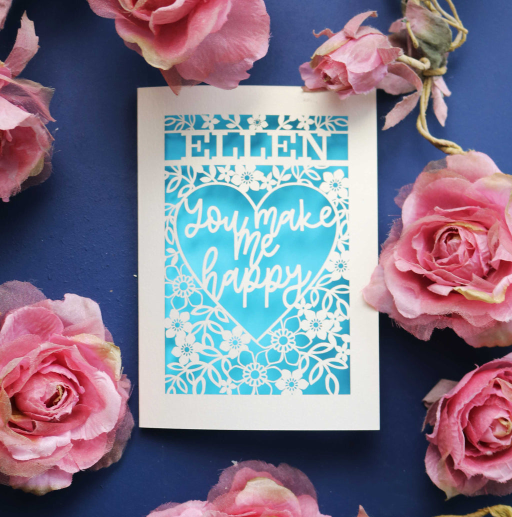 A personalised Valentine's Card that says "Name, You make me happy."