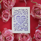 A personalised laser cut card for engagement. Card is personalised with the surname of the couple and says Congratulations Mr and Mrs to be