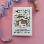 A laser cut personalised First Holy Communion card
