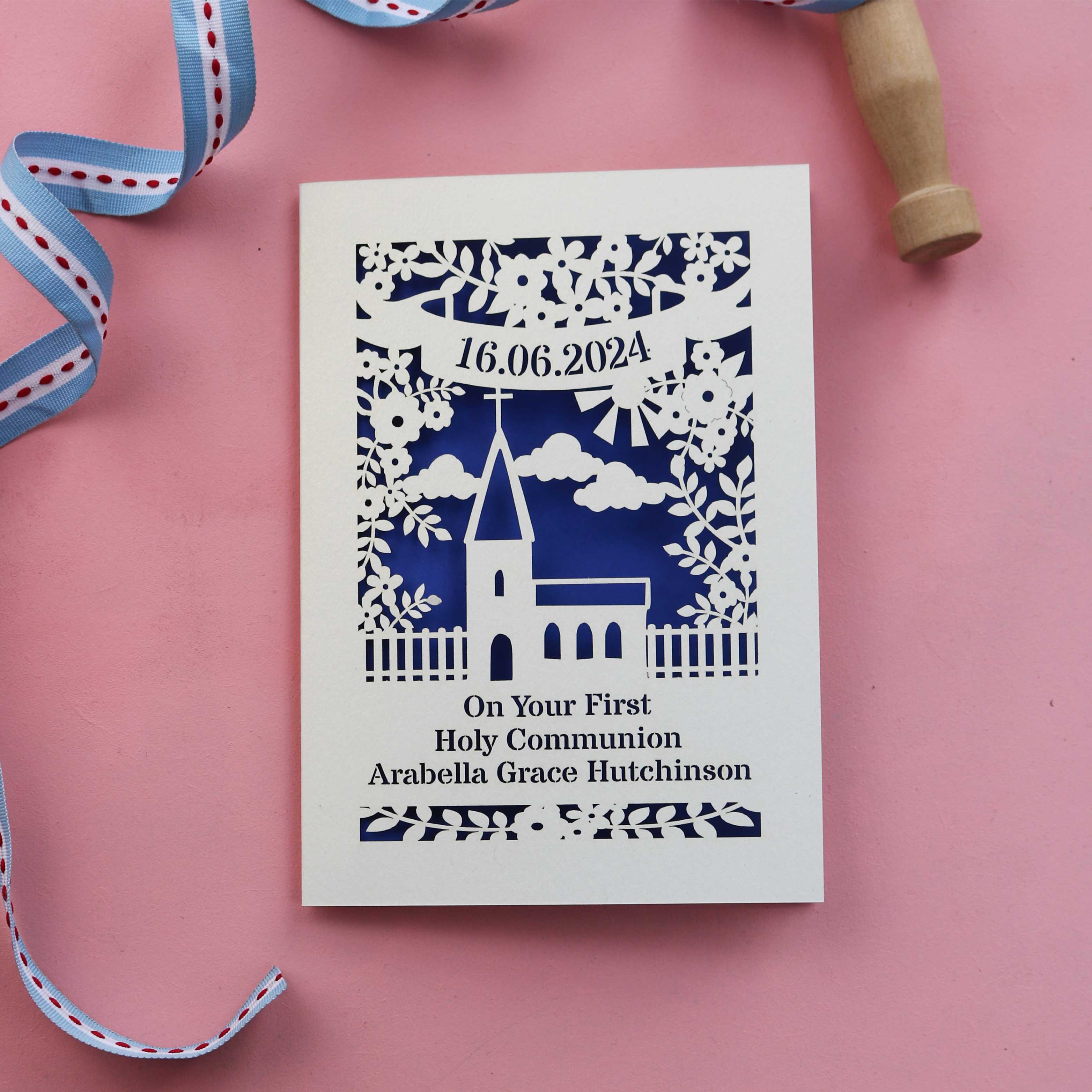A personalised papercut First Holy Communion card
