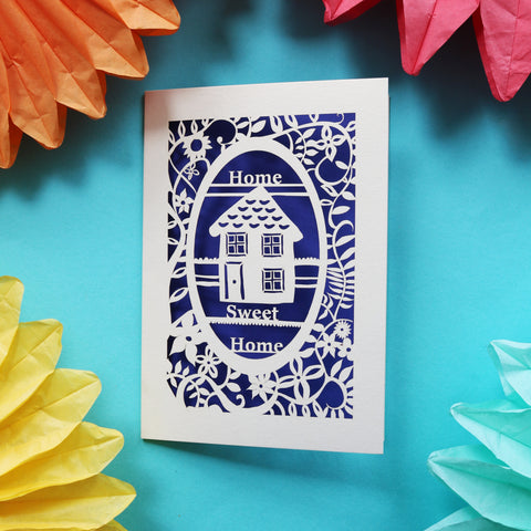 A laser cut new home card made in the UK