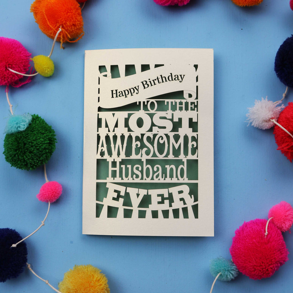 Luxury Husband Birthday card for the most awesome husband ever on a blue background with colourful pom-poms.