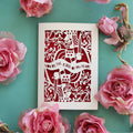 Laser cut Valentines Card for him, with decorative king of hearts cut-out design and text on a green background with roses.