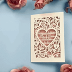 a stop motion video of a laser cut engagement card opening and closing