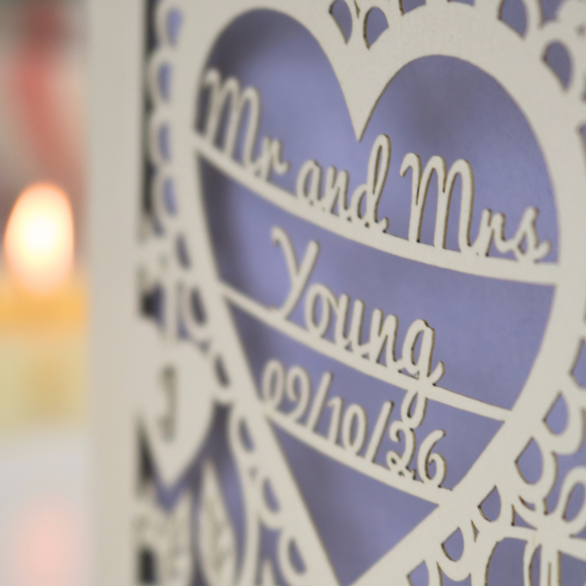 A close-up of a laser-cut card