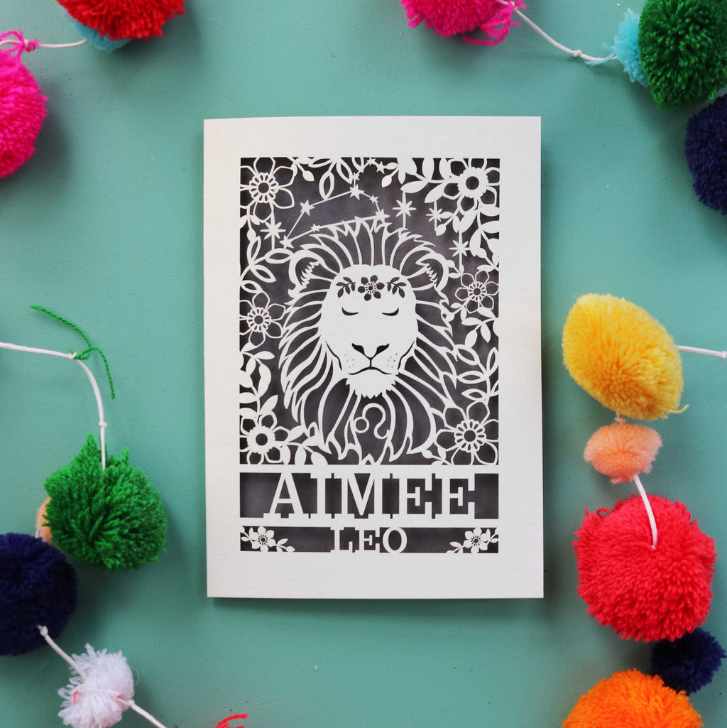 A personalised Leo zodiac birthday card