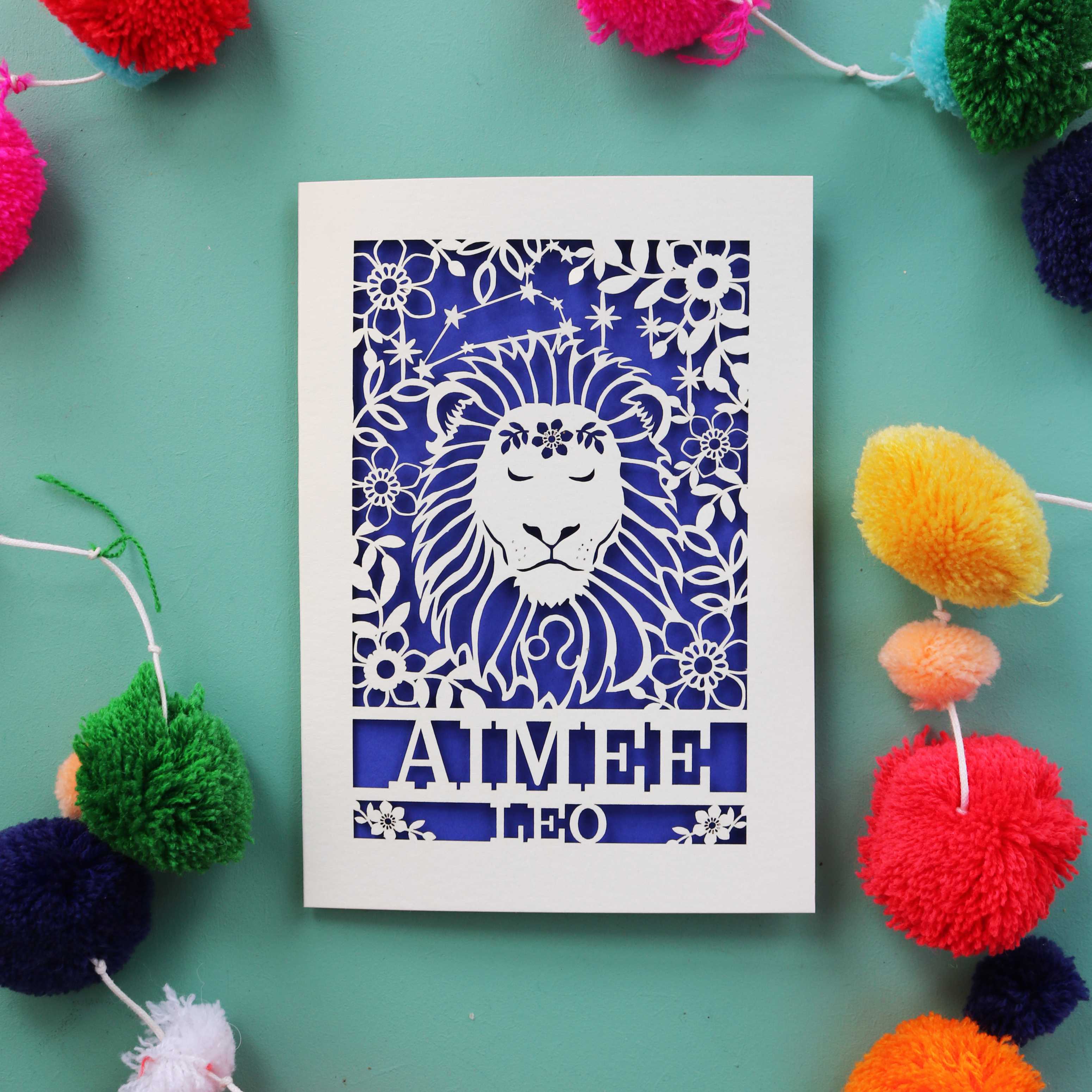 A paper cut birthday card for Leo zodiac signs