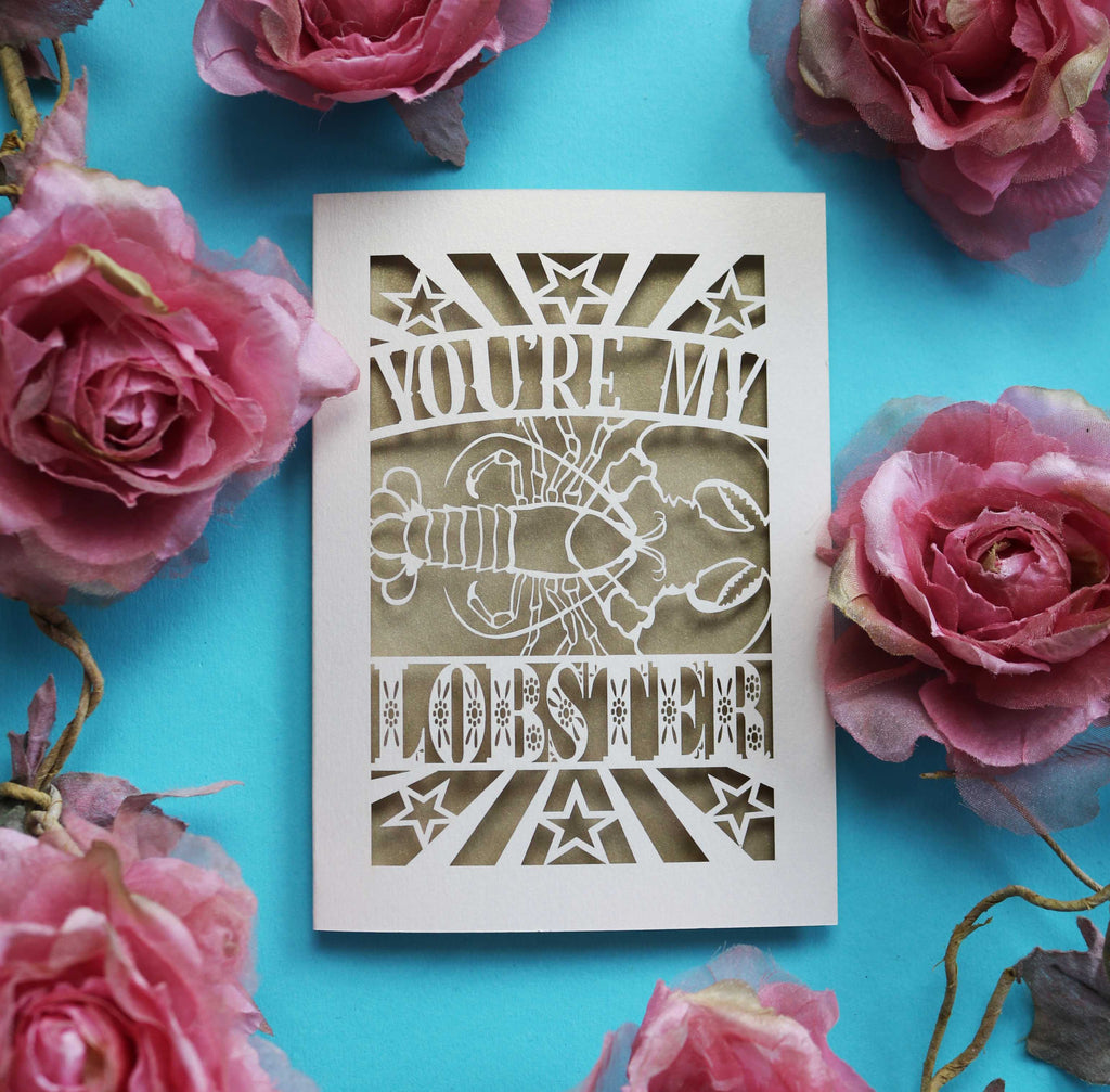 A lobster Valentine's card that says "You're My Lobster" with a cut out design of a lobster