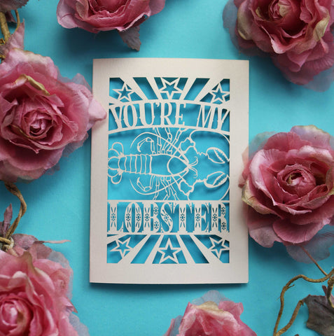 A papercut Valentine's card that says "You're My Lobster" with a cut out design of a lobster - A6 (small) / Peacock Blue