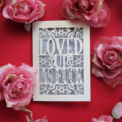 A papercut Valentine's Day Card, laser cut with the words "Loved up as fuck" - A6 (small) / Silver