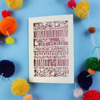 Luxury engagement Card made in the UK, with 'Congratulations on your engagement' text on a blue background with colourful pom-poms.