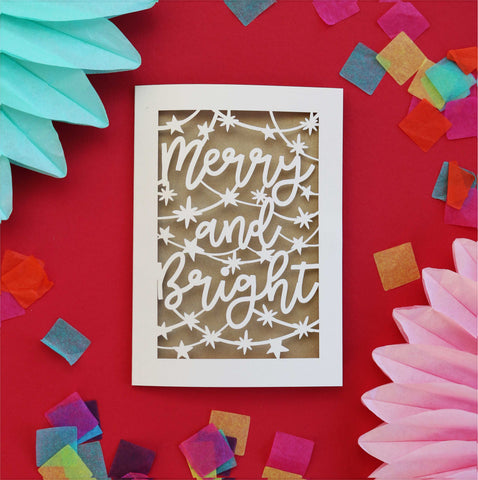 Cream laser cut Christmas cards with stars and cut out design that says 'merry and bright' - A6 (small) / Gold Leaf