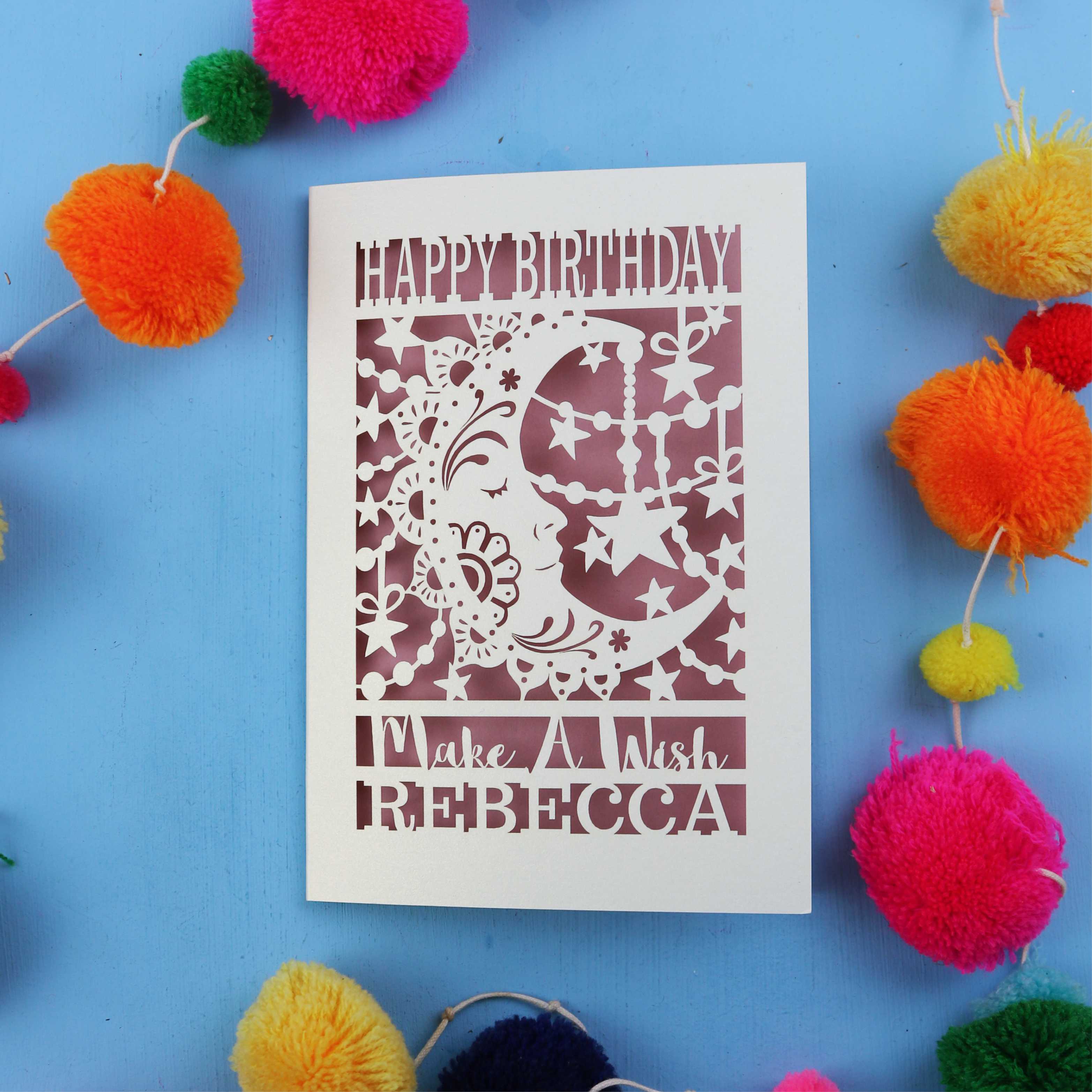 Personalised crescent moon Birthday card with decorative elements on a blue background