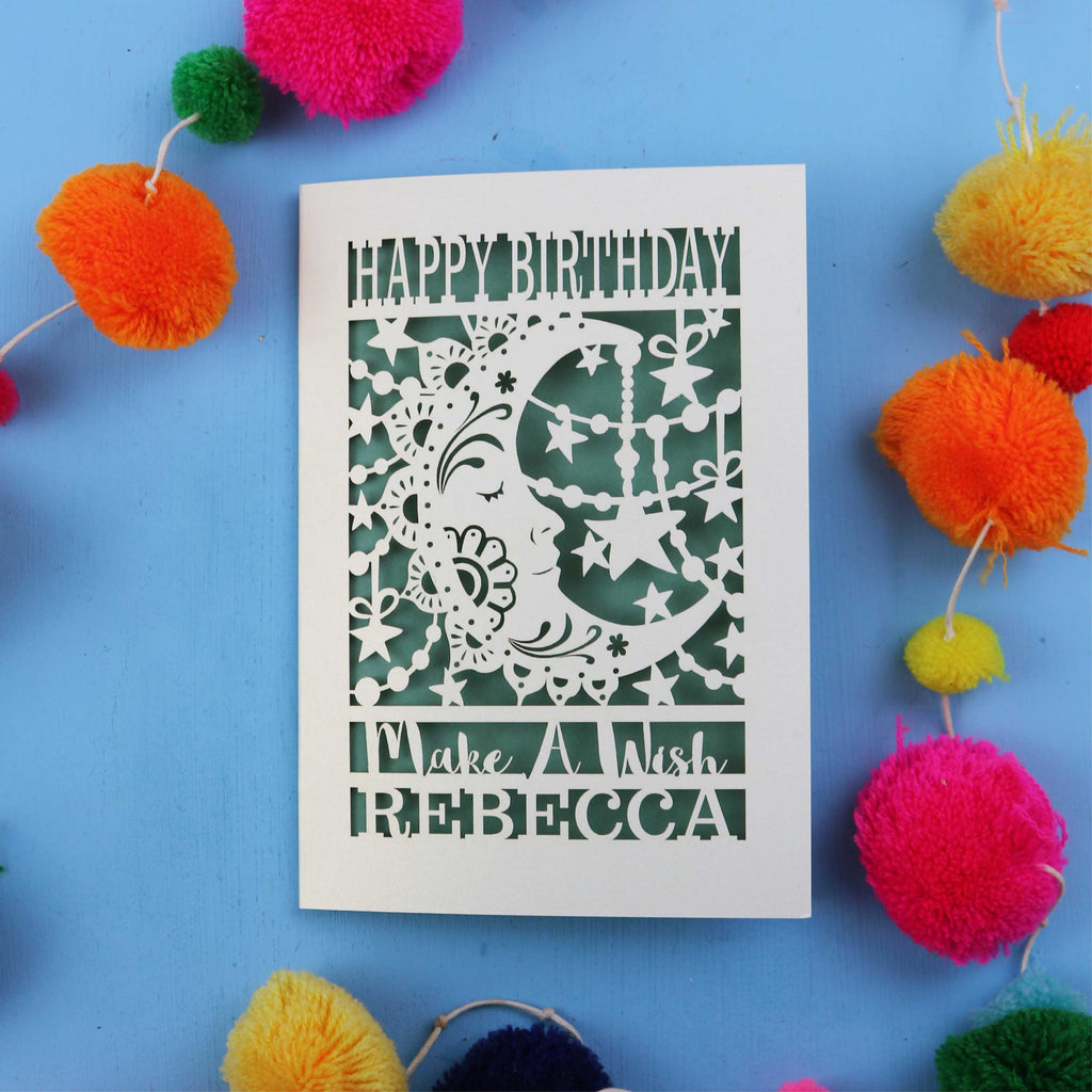 Personalised Moon Birthday card with decorative elements on a blue background