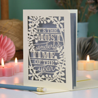 A laser cut Christmas card in cream with decorative text, 'It's the most wonderful time of the year'