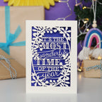 Decorative laser cut Christmas card with 'It's the most wonderful time of the year' text 