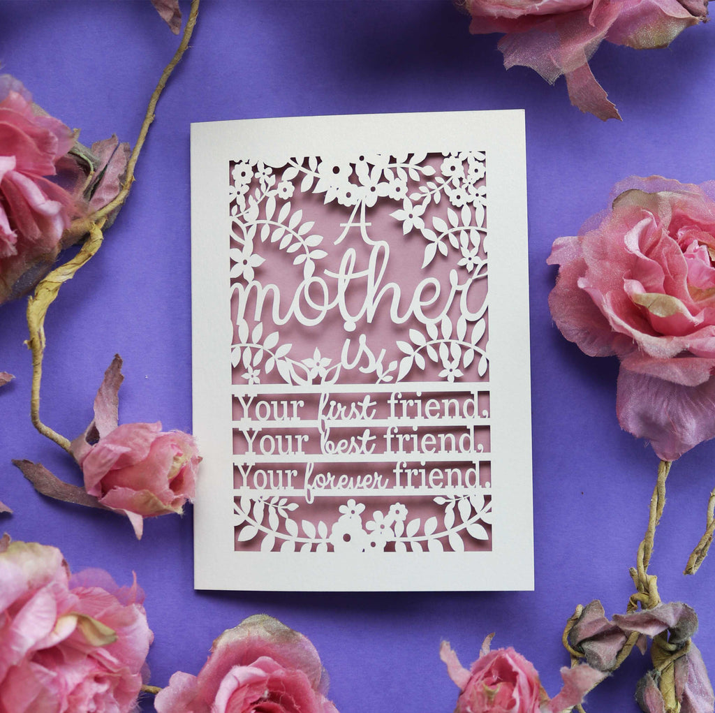 A laser cut Mothering Sunday day card that says "A mother is your first friend, your best friend, your forever friend."